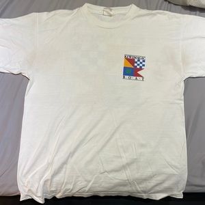 white shirt with colorful design on back